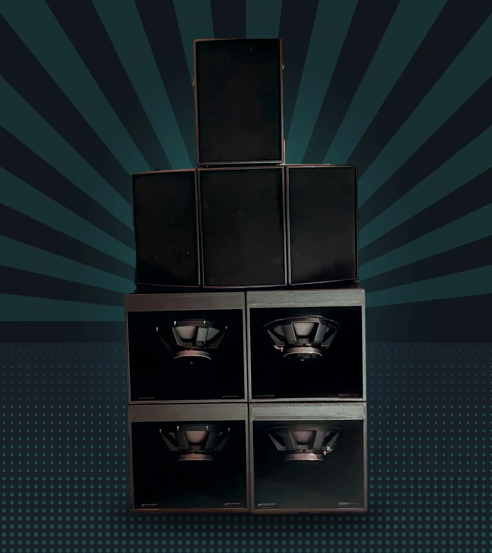 The self-built modular PA system with tops and subwoofers set up for an event