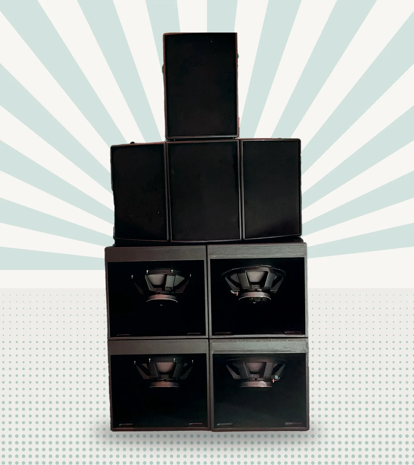The self-built modular PA system with tops and subwoofers set up for an event